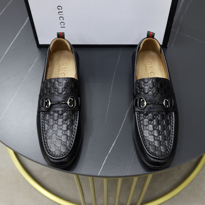 G*u*i leather shoes